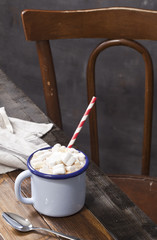Hot chocolate cup with marshmallows.