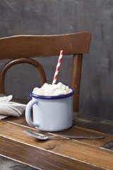 Hot chocolate cup with marshmallows.