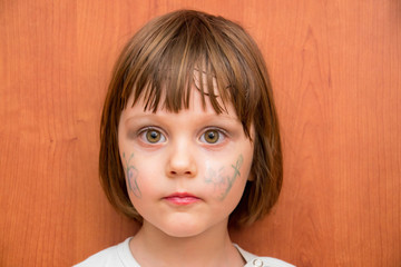 Little girl with butterfly face paint
