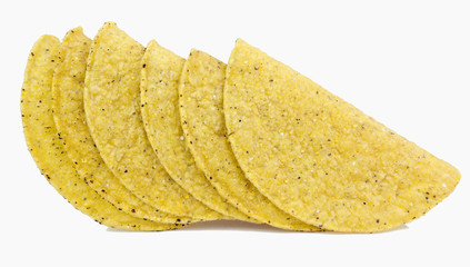 Cuddling, spooning yellow corn taco shells. Isolated.