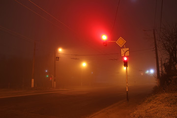 Fototapeta na wymiar traffic light in the fog