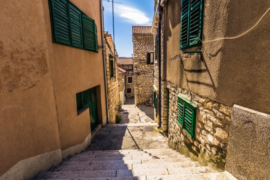 July 20, 2016: Street going down in the old town of Sibenik, Cro