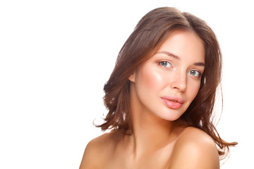 Fototapeta premium Close up portrait of beautiful young woman face. Isolated on white background.