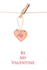 Heart hanging on the rope, isolated on white background with text: Be My Valentine