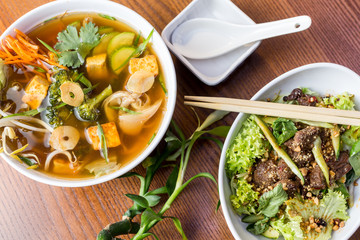 Asian dinner dishes -  soup and salad