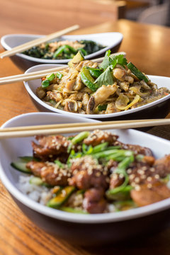 Asian food with chicken, mushrooms and vegetables