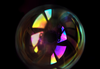 Colorful soap bubble isolated on black