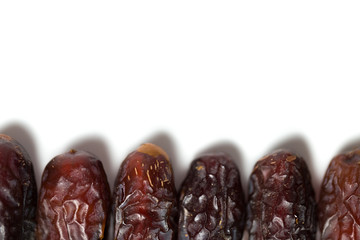 A dried dates isolated over white background