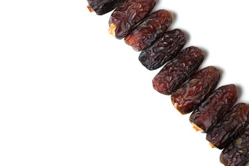 A dried dates isolated over white background