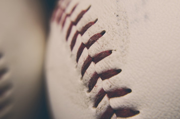 Close up of baseball and ball stitches