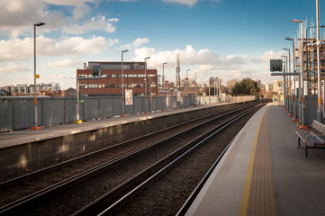 Fototapeta na wymiar Train station, overground rail network of London TFL, Imperial Wharf.