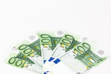 Obraz na płótnie Canvas One hundred euro banknotes on white background