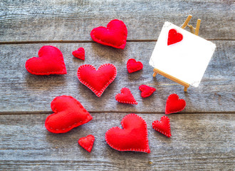 Naklejka na ściany i meble Valentine card with red hearts