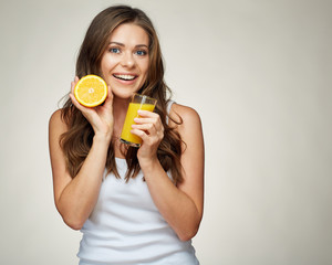 smiling woman holding orange juice and fruit. vitamin drink.