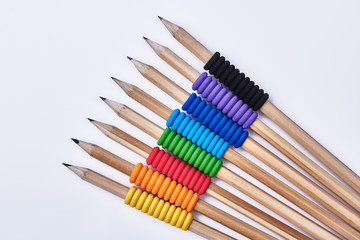 Sharp graphite pencils. Wooden pencils with rubber foam. Preparation for school.