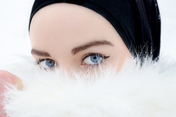 young beautiful muslim girl outdoor in winter