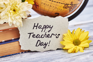 Globe and bouquet of flowers. Thank you teacher.