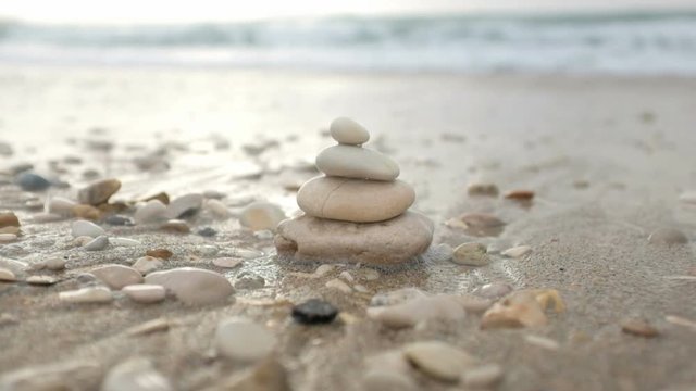Stones pyramid at the beach, zen concept
