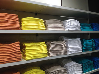 Rows of  folded clothes.