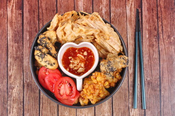 Deep fried dessert of corn ,taro ,nian gao and banana .