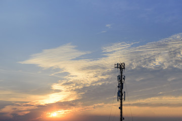 Obraz premium The silhouette scene of antenna tower with the sunset scene.