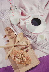 Breakfast set. Bread with jam over the chopping wood on table se