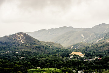 Mountains with morning mist and a temple