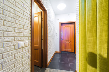 Hallway in modern style and the main door