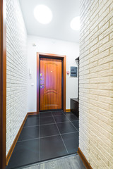 Hallway in modern style and the main door