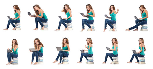 Fototapeta na wymiar Student with netbook sitting on books