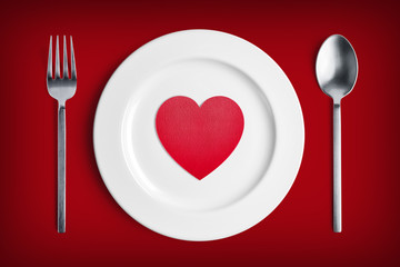 Red heart on white plate for valentine's day