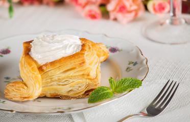 Puffs with cheese are on the table. Very tasty and delicious breakfast.
