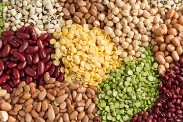 Colorful different heap of grains legumes and beans seed top view - obrazy, fototapety, plakaty