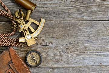 vintage still life with compass,sextant and spyglass - 135997844