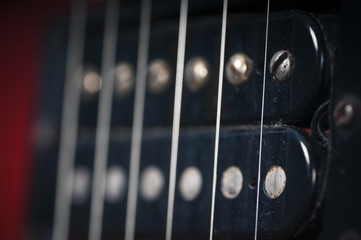 The pickups on the old electric guitar