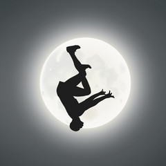 A Man Somersaulting Under The Moonlight