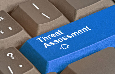 Keyboard with key for threat assessment - obrazy, fototapety, plakaty