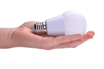 LED bulb in hand on white background. Energy saving lamp.