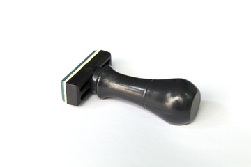 Rubber stamper isolated on white background.