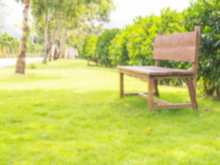 Soft blur wooden bench in the park