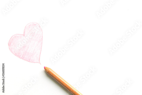  Drawing heart shape with pencil isolated on white background. Stock 