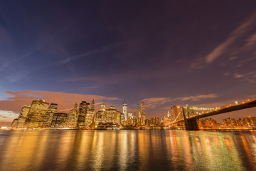 Fototapeta premium Night view of Manhattan and Brooklyn bridge