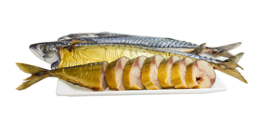 Sliced smoked Atlantic mackerel on background of uncooked fish