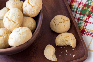 Homemade shortbread round crumbly biscuits made of rice flour in a wooden bowl. Selective focus