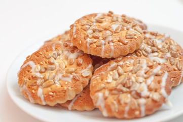 Round cookies with sunflower and sesame seeds, small depth of fi