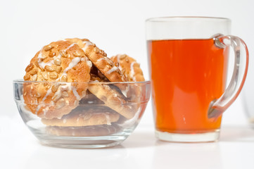 Round cookies with sunflower and sesame seeds, tea or other drin