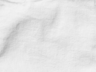 White denim textile material with visible texture for background