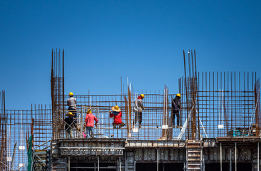 Construction workers under the sun