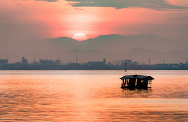 Golden light with abandoned hut