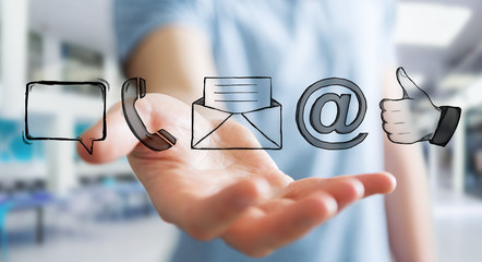 Businessman holding manuscript contact icon in his hand